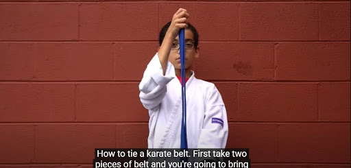 How to Tie a Karate Belt - Step 1 Find the Center